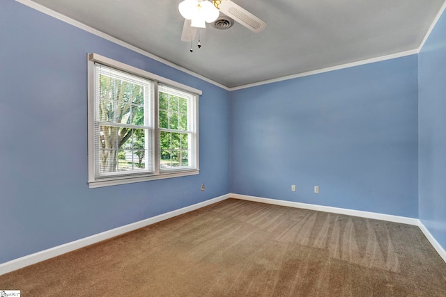 carpeted empty room featuring ornamental molding and ceiling fan