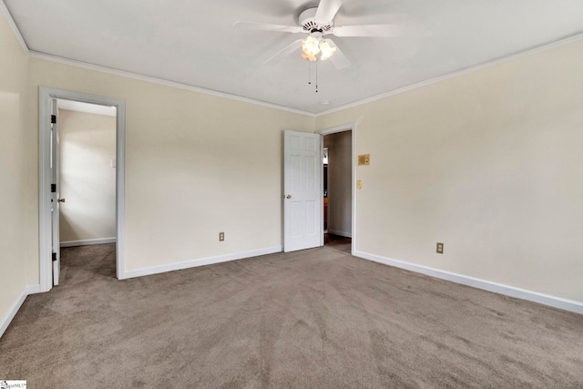 unfurnished bedroom featuring ornamental molding, carpet, baseboards, and a ceiling fan