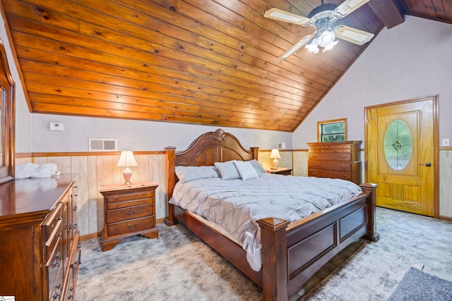 carpeted bedroom with wood ceiling, ceiling fan, and vaulted ceiling