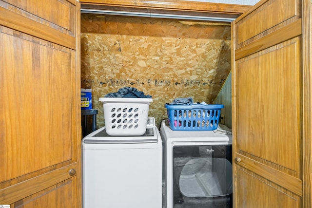 laundry area featuring separate washer and dryer