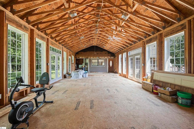 miscellaneous room with lofted ceiling and french doors