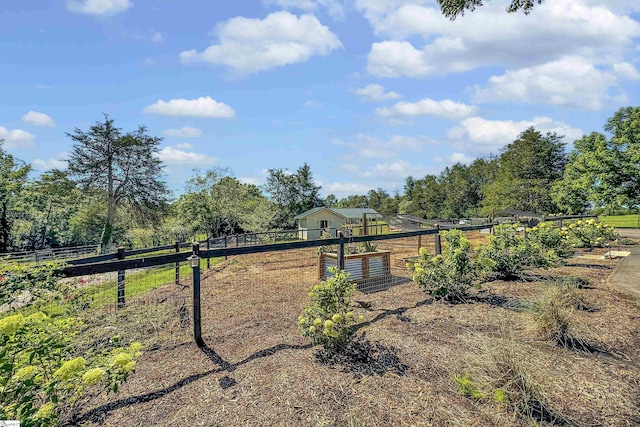 exterior space with a rural view