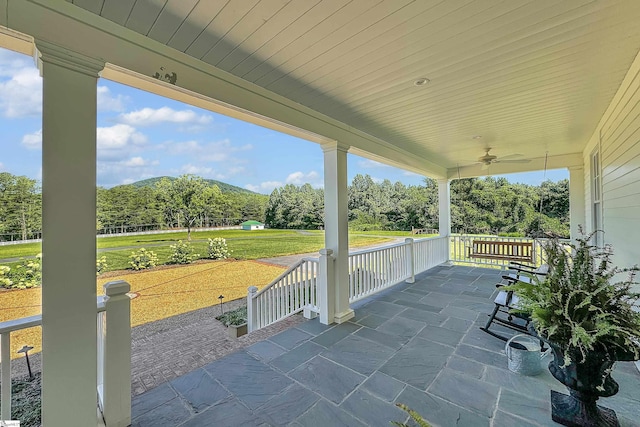 view of patio / terrace featuring a porch and ceiling fan