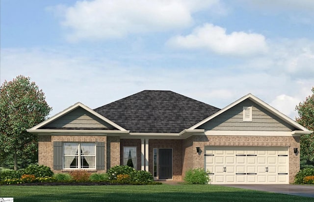 view of front of house featuring a garage and a front yard