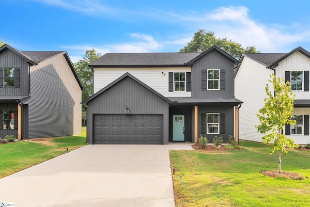 view of front facade featuring a garage and a front yard