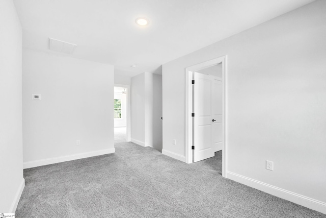 unfurnished room with carpet