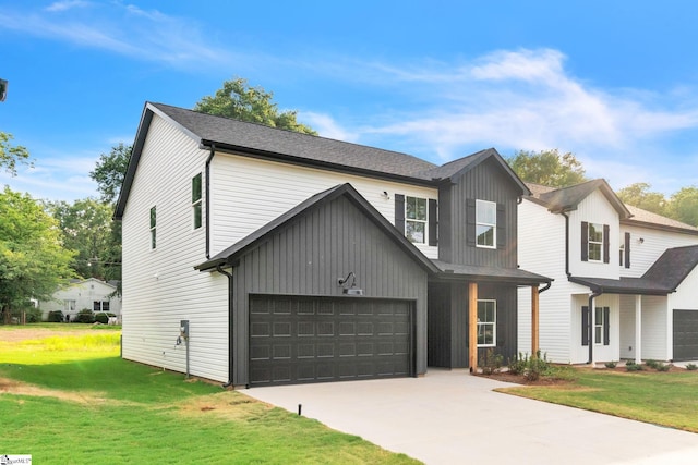 modern inspired farmhouse with a front lawn