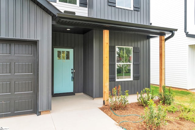 property entrance with a garage