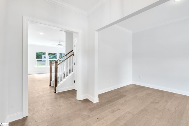 unfurnished room with ornamental molding, ceiling fan, and hardwood / wood-style floors