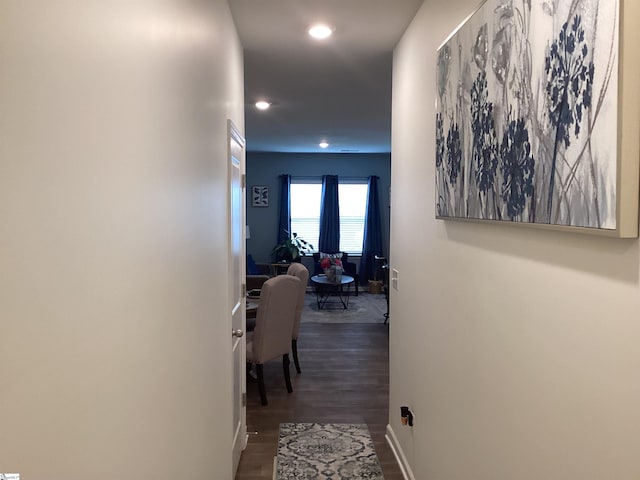 hallway featuring dark hardwood / wood-style floors