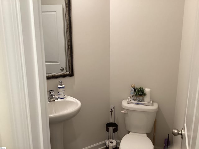 bathroom featuring toilet