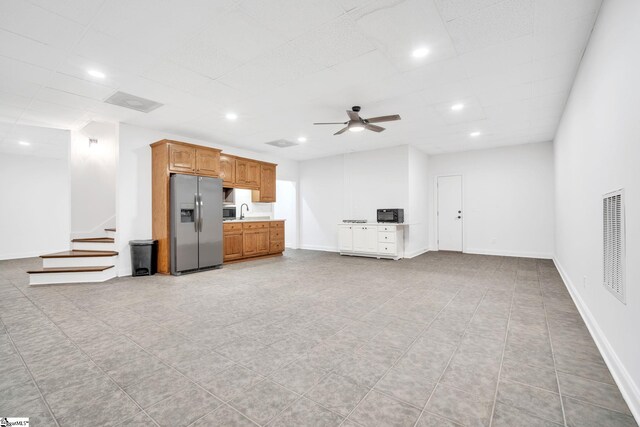 unfurnished sunroom with wooden ceiling and ceiling fan