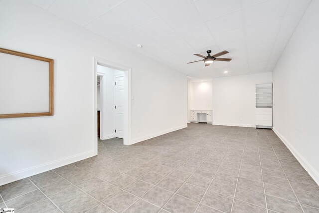 view of patio featuring ceiling fan