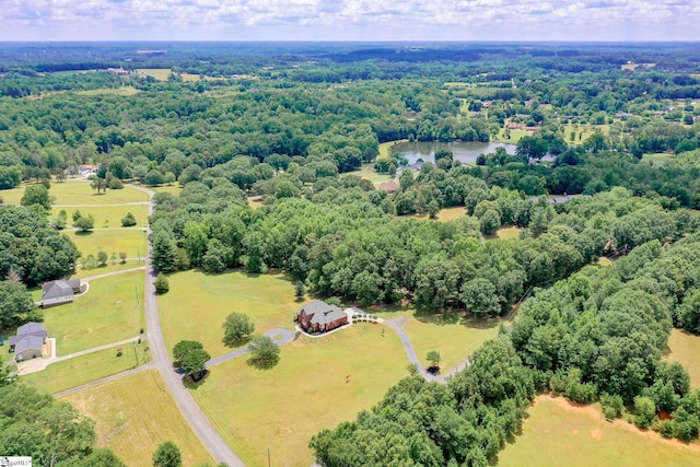 aerial view with a water view and a rural view