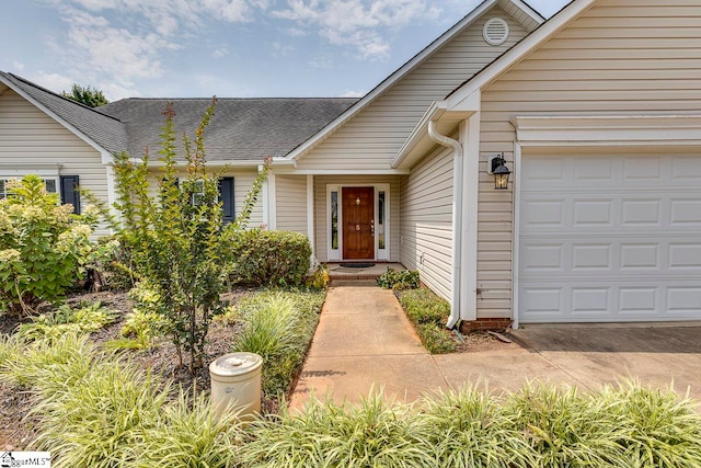 property entrance with a garage