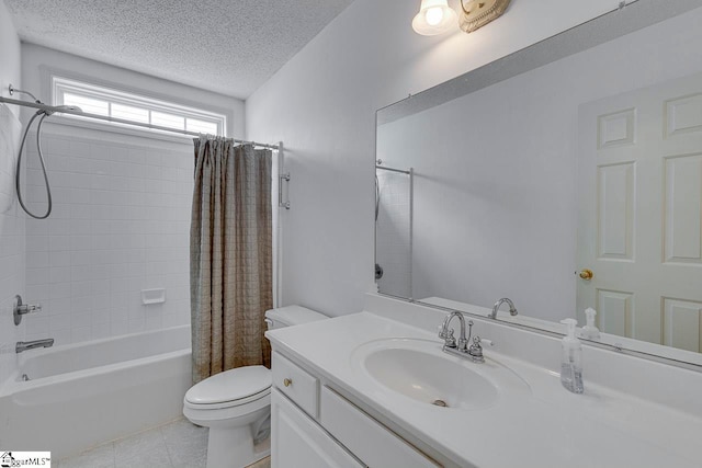 full bathroom featuring vanity, tile patterned floors, shower / tub combo, toilet, and a textured ceiling