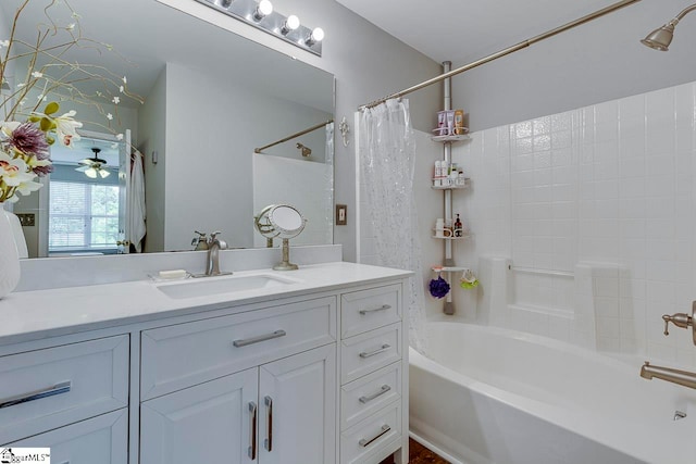 bathroom featuring vanity and shower / tub combo with curtain