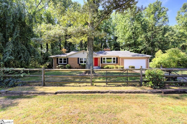 ranch-style home featuring a front lawn