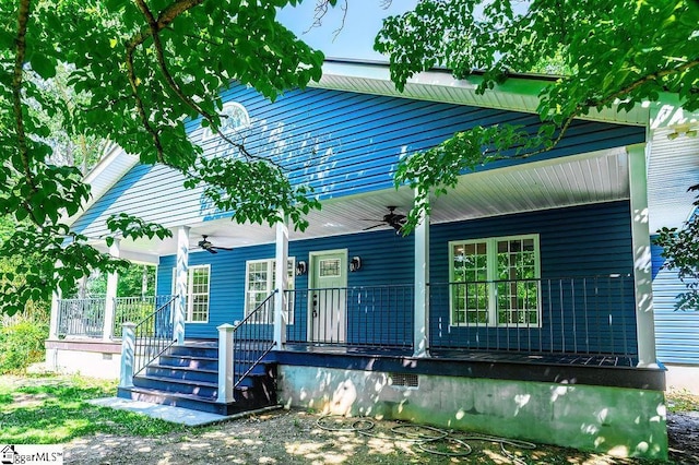 view of front of house with ceiling fan and covered porch