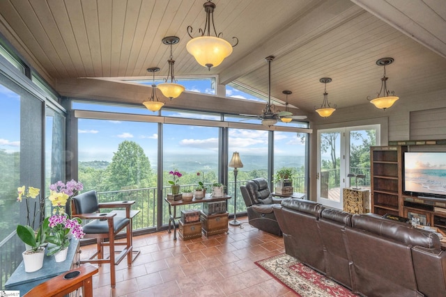 sunroom featuring wooden ceiling and lofted ceiling