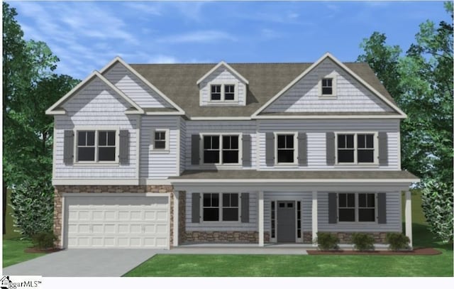 view of front facade with a garage and a front yard