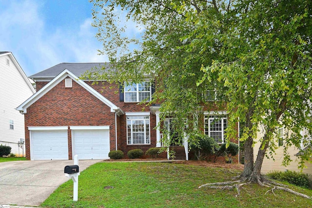 view of front facade featuring a garage and a front yard