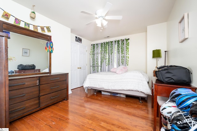 bedroom featuring wood-type flooring and ceiling fan