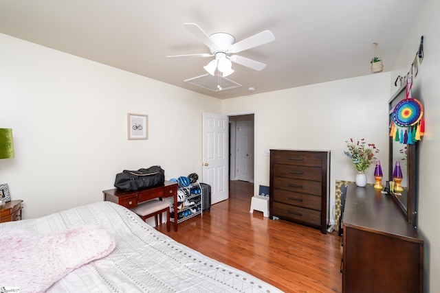 bedroom featuring dark wood-type flooring and ceiling fan