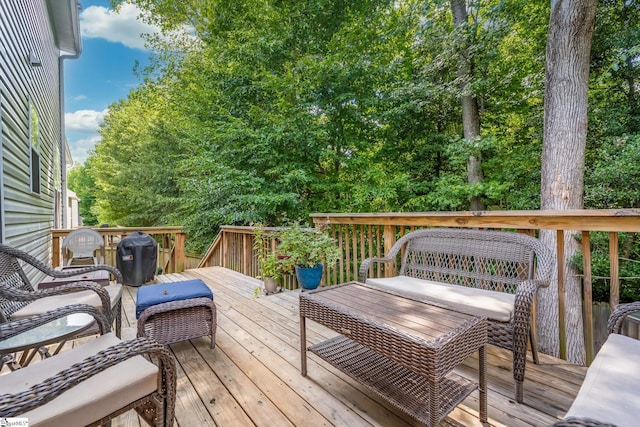 wooden deck with area for grilling