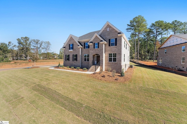 view of front of house featuring a front yard