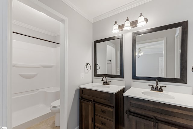 bathroom featuring crown molding, a shower, vanity, and toilet