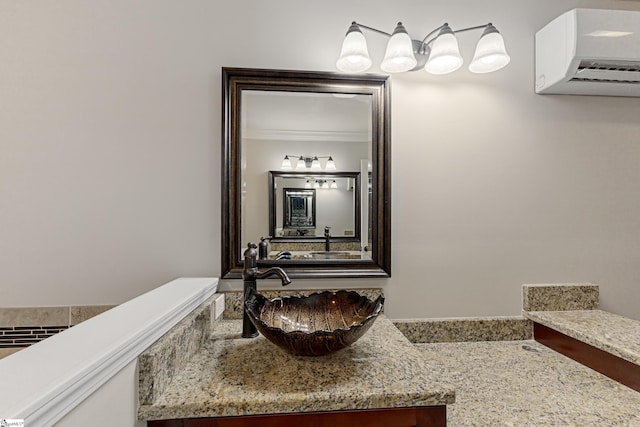 bathroom featuring ornamental molding, vanity, and a wall mounted AC