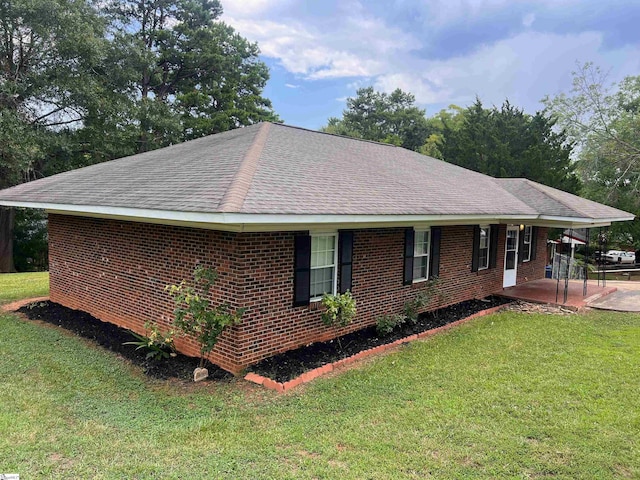 exterior space with a lawn