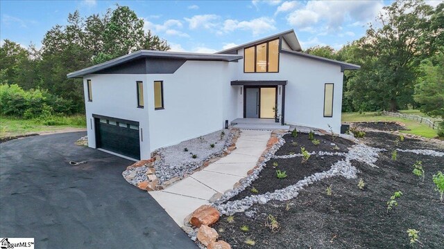 contemporary home with a garage