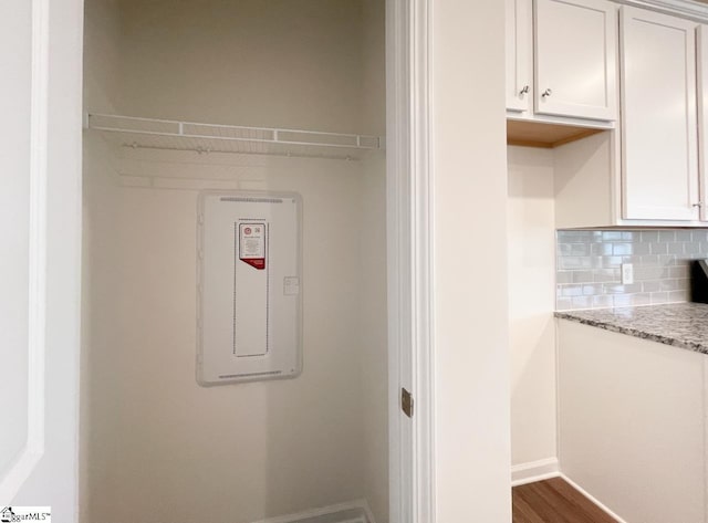 washroom with dark hardwood / wood-style floors