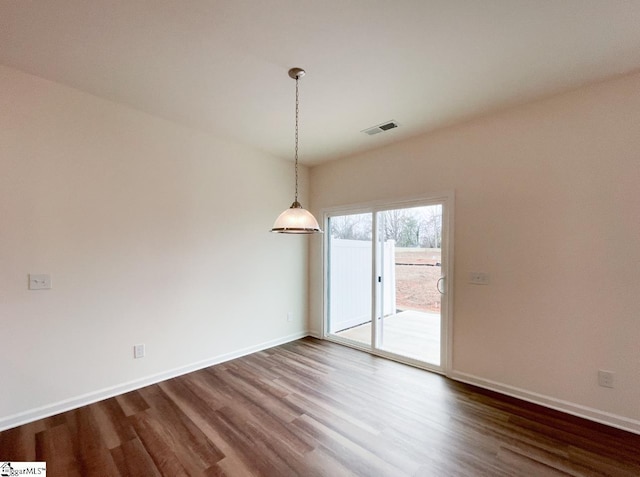 unfurnished dining area with hardwood / wood-style flooring