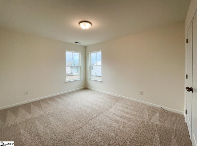 214 Toal Ct, Greenville, SC 29611 - empty room with visible vents, light colored carpet, and baseboards