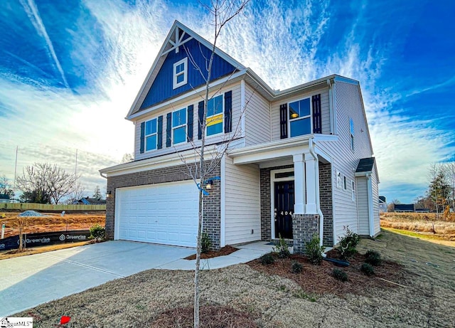 view of front of property featuring a garage