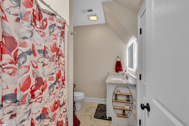 bathroom with vanity, toilet, and a shower with shower curtain