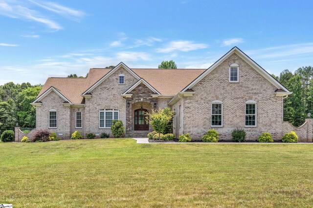 view of front of home with a front lawn