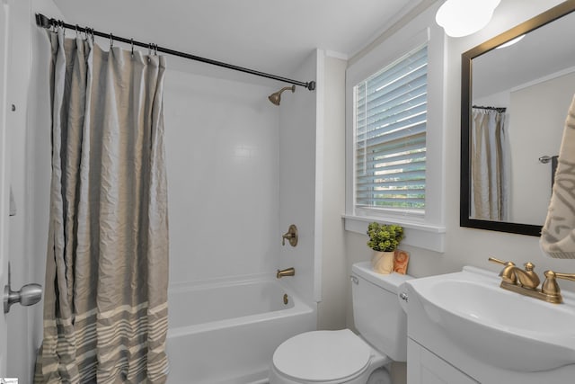 full bath with vanity, toilet, and shower / bath combo with shower curtain