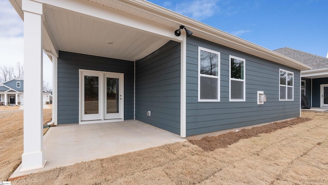 back of property with a patio area