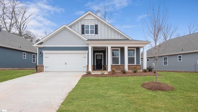 craftsman-style house with concrete driveway, a front yard, board and batten siding, and brick siding