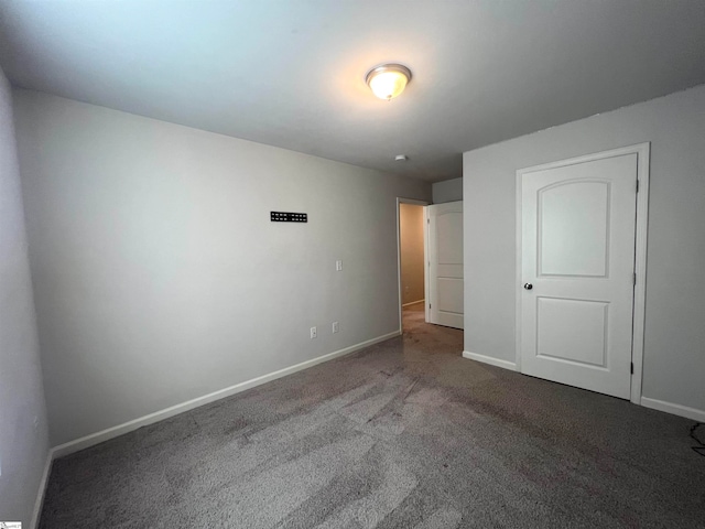 unfurnished bedroom with carpet floors