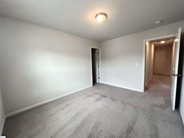 unfurnished bedroom featuring carpet flooring