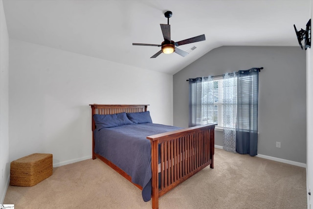 carpeted bedroom featuring ceiling fan and lofted ceiling