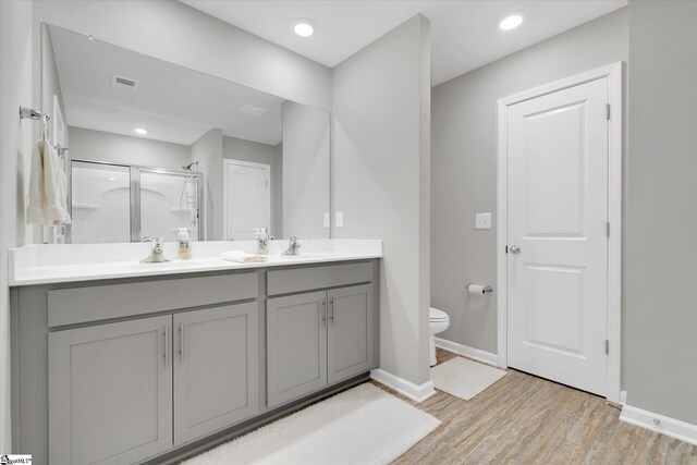 carpeted bedroom featuring lofted ceiling, ceiling fan, and connected bathroom