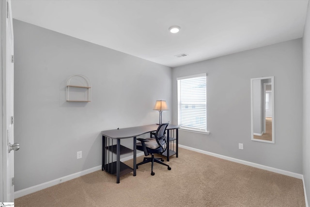 home office featuring light carpet