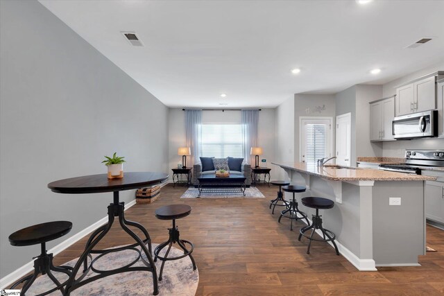 entryway with wood-type flooring