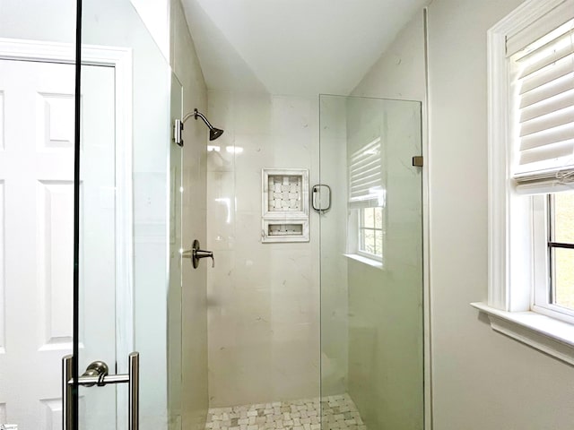 bathroom with an enclosed shower